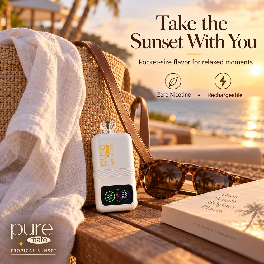 Pure Mate Tropical Sunset diffuser beside a beach bag and sunglasses during golden hour
