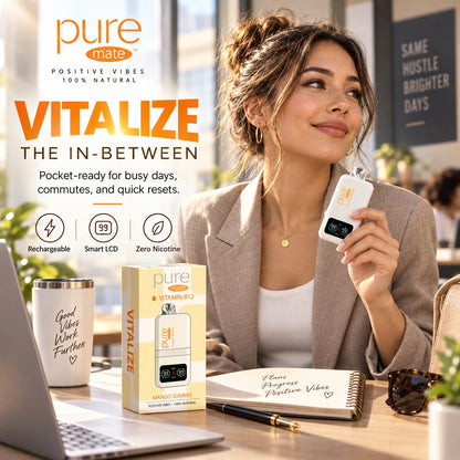 Woman holding Pure Mate Vitalize Mango Sunrise diffuser at a desk during a busy workday